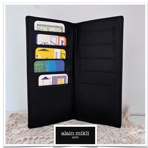 NWOT Vintage 90s Alain Mikli Paris, Leather Wallet Slim style.
Black